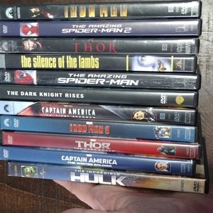 11 DVDs (Marvel, Dark Knight Rises and Silence of the lambs) No digital codes.